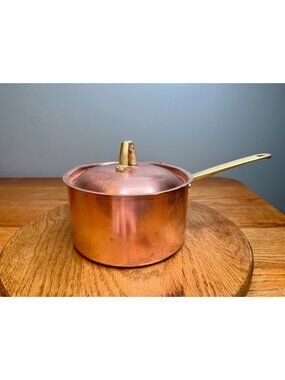 Paul Revere limited edition copper  2 quart saucepan featuring a brass handle an